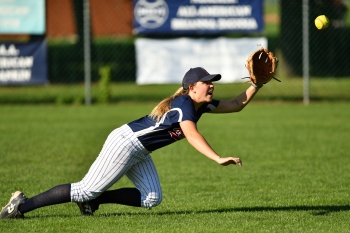 Emma Schriner diving to catch the softball