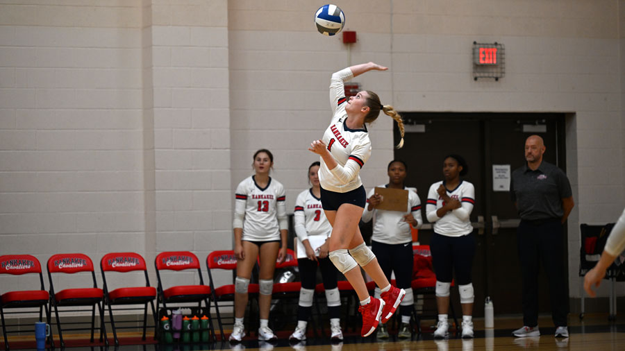 Volleyball player hitting the ball in the air